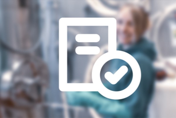 a blurred industrial image and a checklist icon